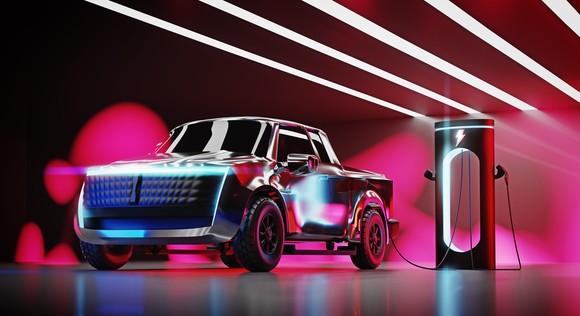 An electric truck being charged.