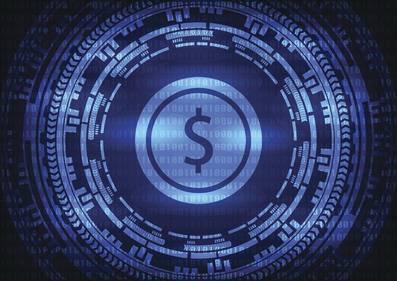 A dollar sign sits in the center of a series of circling lenses.