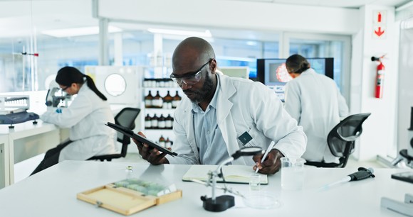 A scientist works in a lab.
