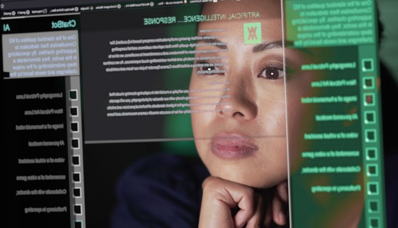 Person looking at lines of code on a screen.