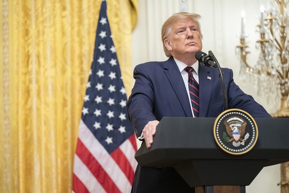 Donald Trump delivering remarks in the East Room of the White House.