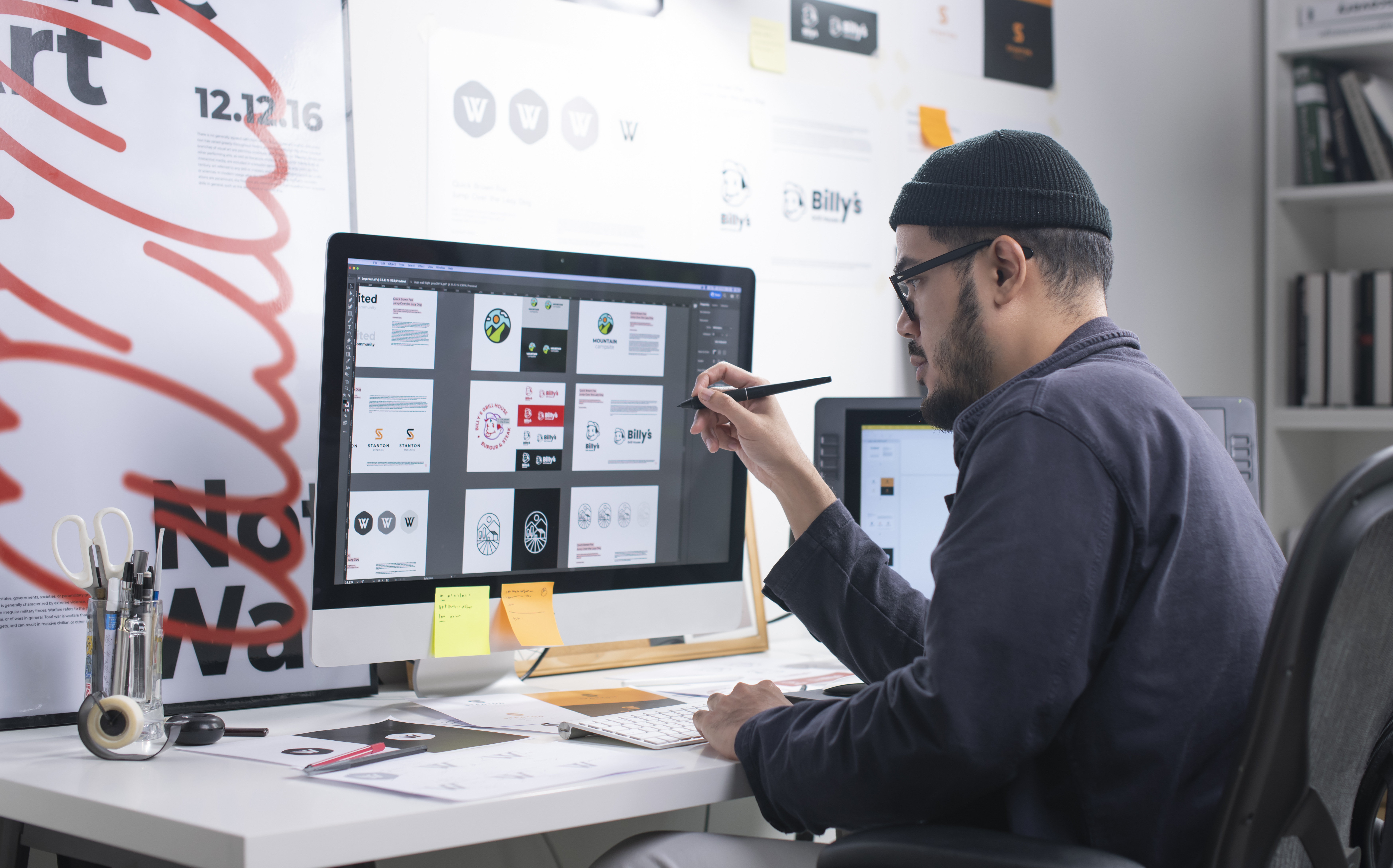 A man works on a computer.