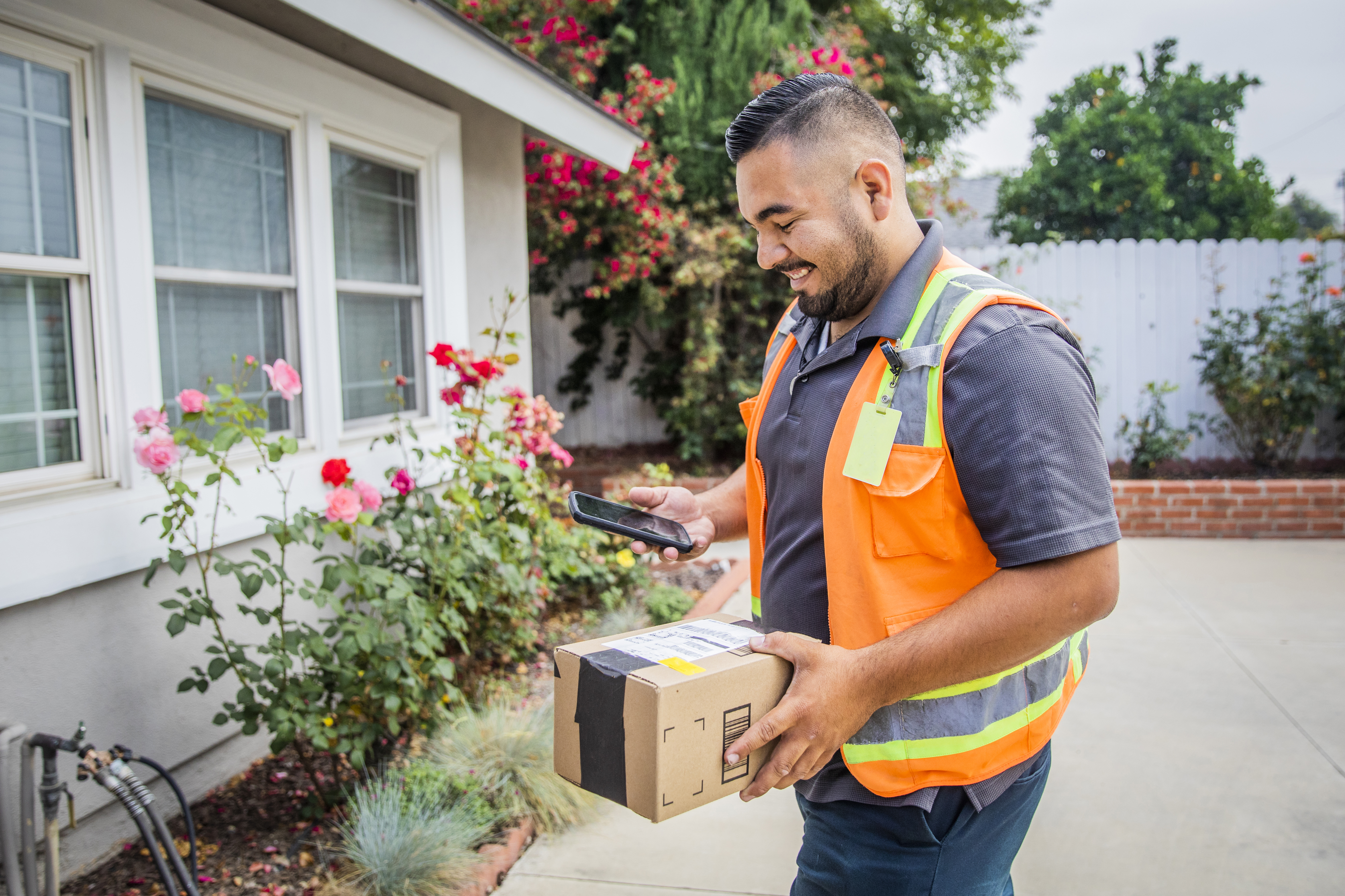 A delivery person dropping off a package.