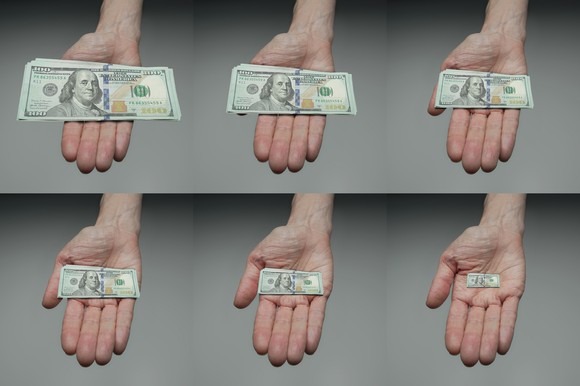 A series of hands with smaller and smaller-sized paper money in them.