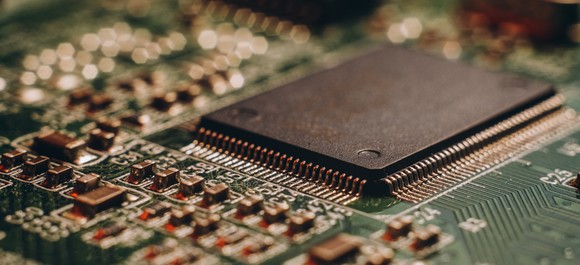 A large microchip embedded on a circuit board.