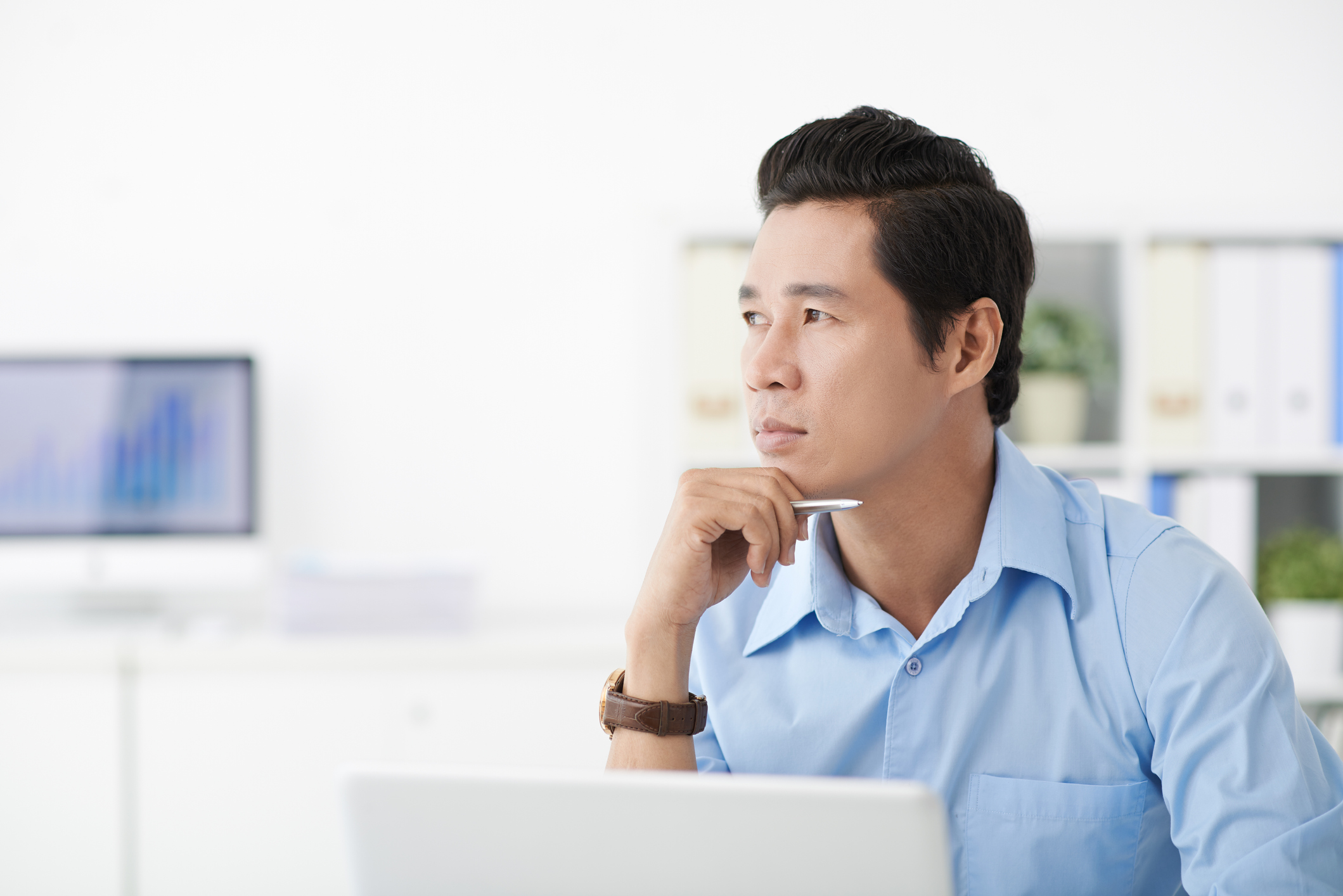 A person at a laptop.