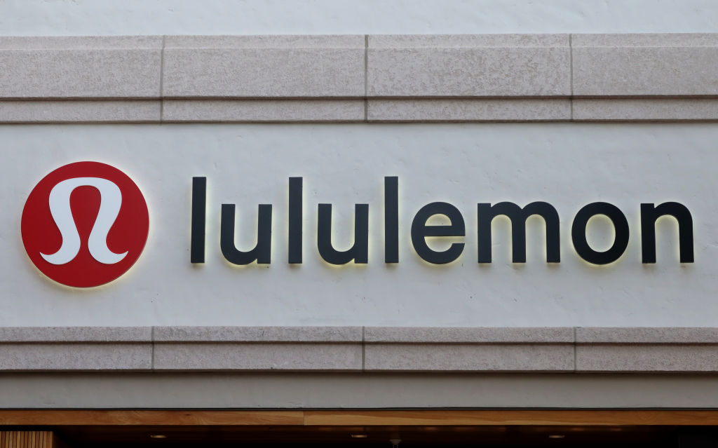 The Lululemon logo on a building.