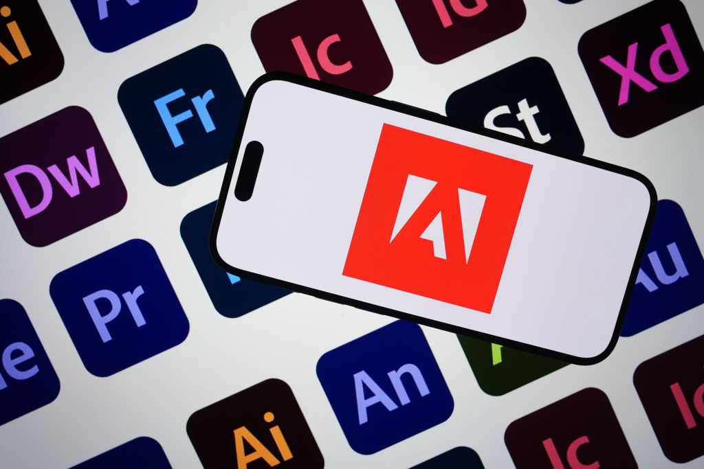 Adobe's corporate logo on a smartphone screen.