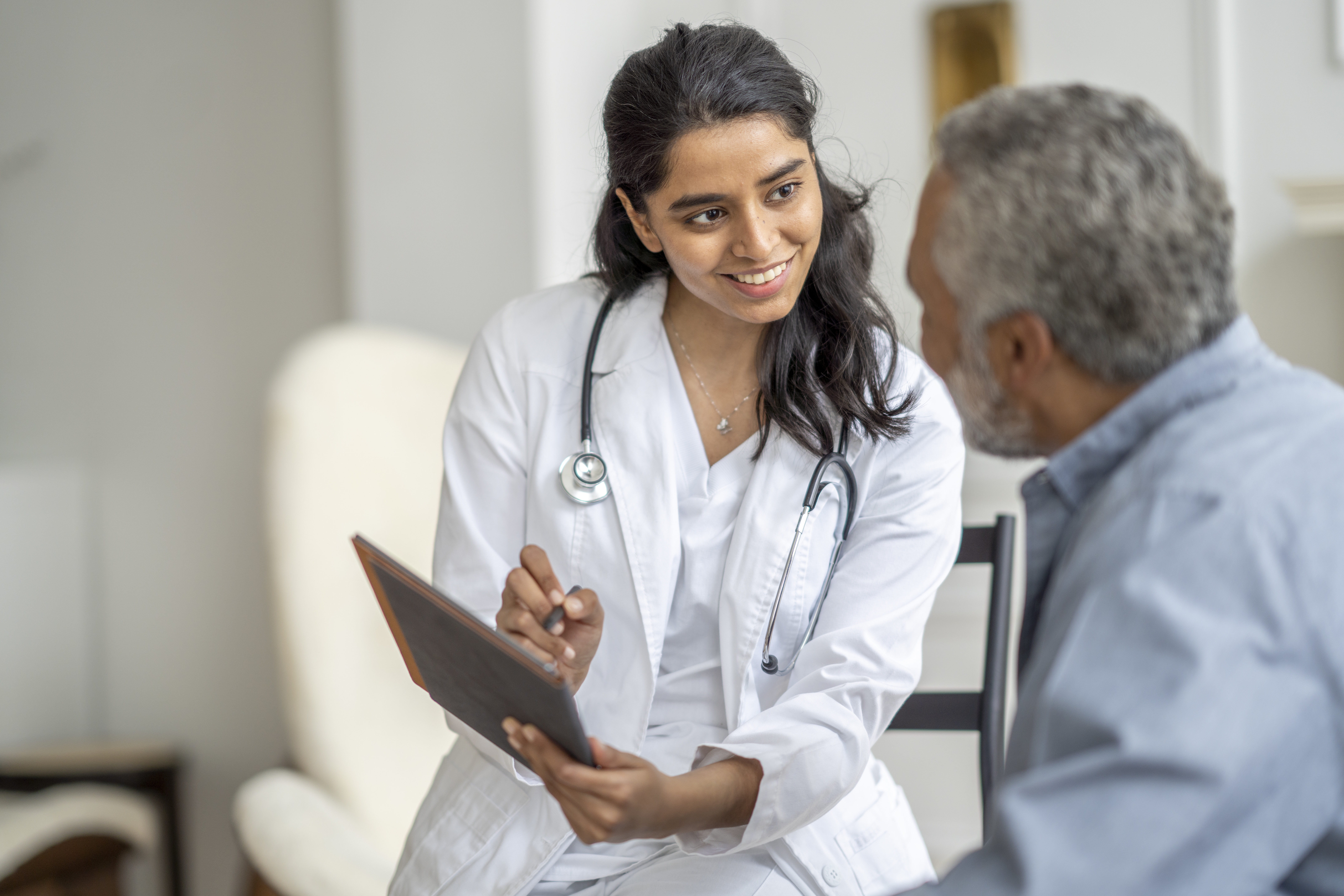doctor and older patient GettyImages-1390886692