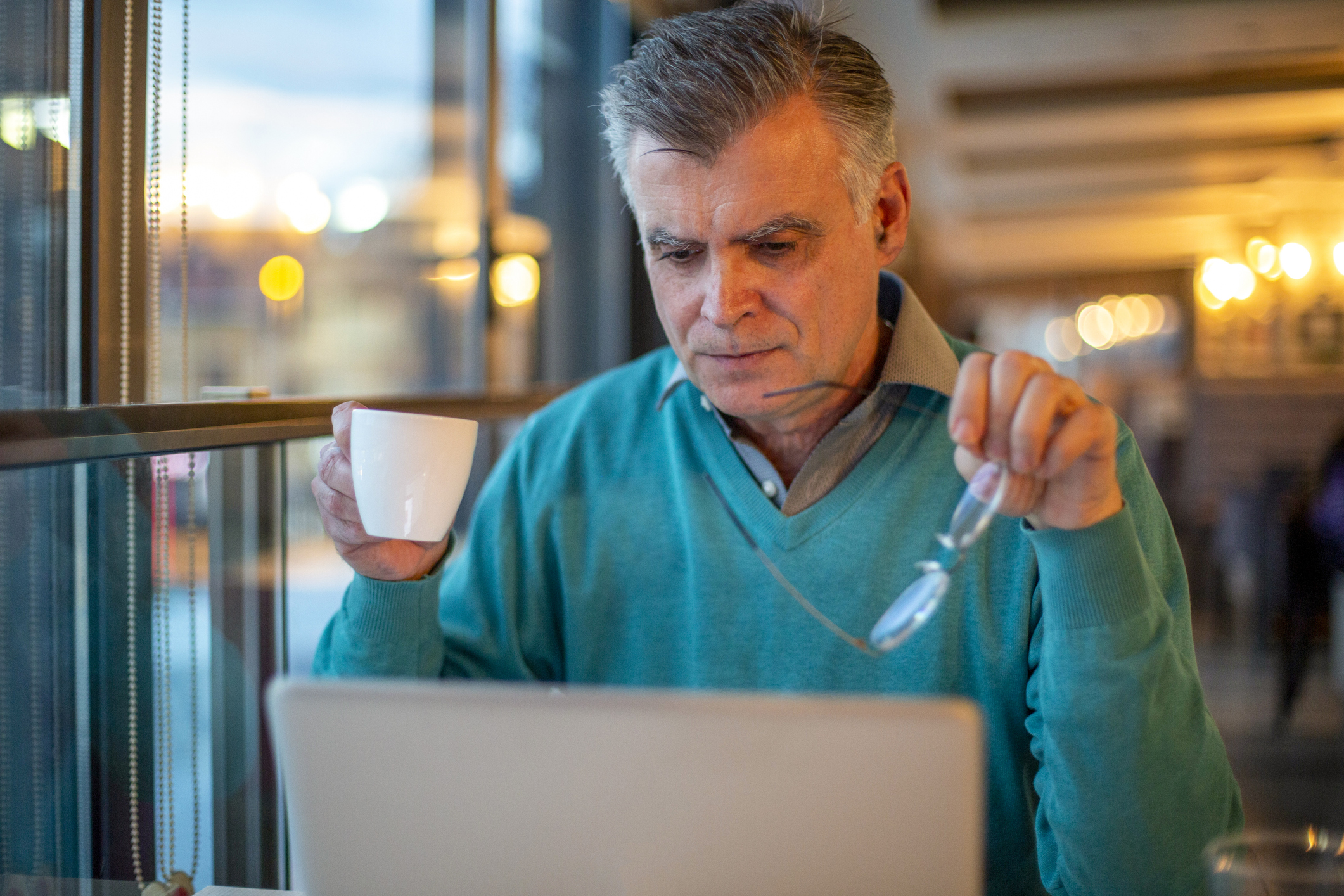 Older man laptop GettyImages-1426269566