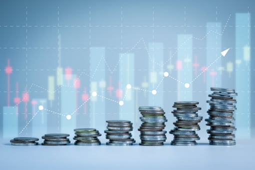 Steadily rising stacks of coins.