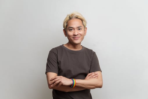 Getty - arms crossed smiling pride lgbt gay