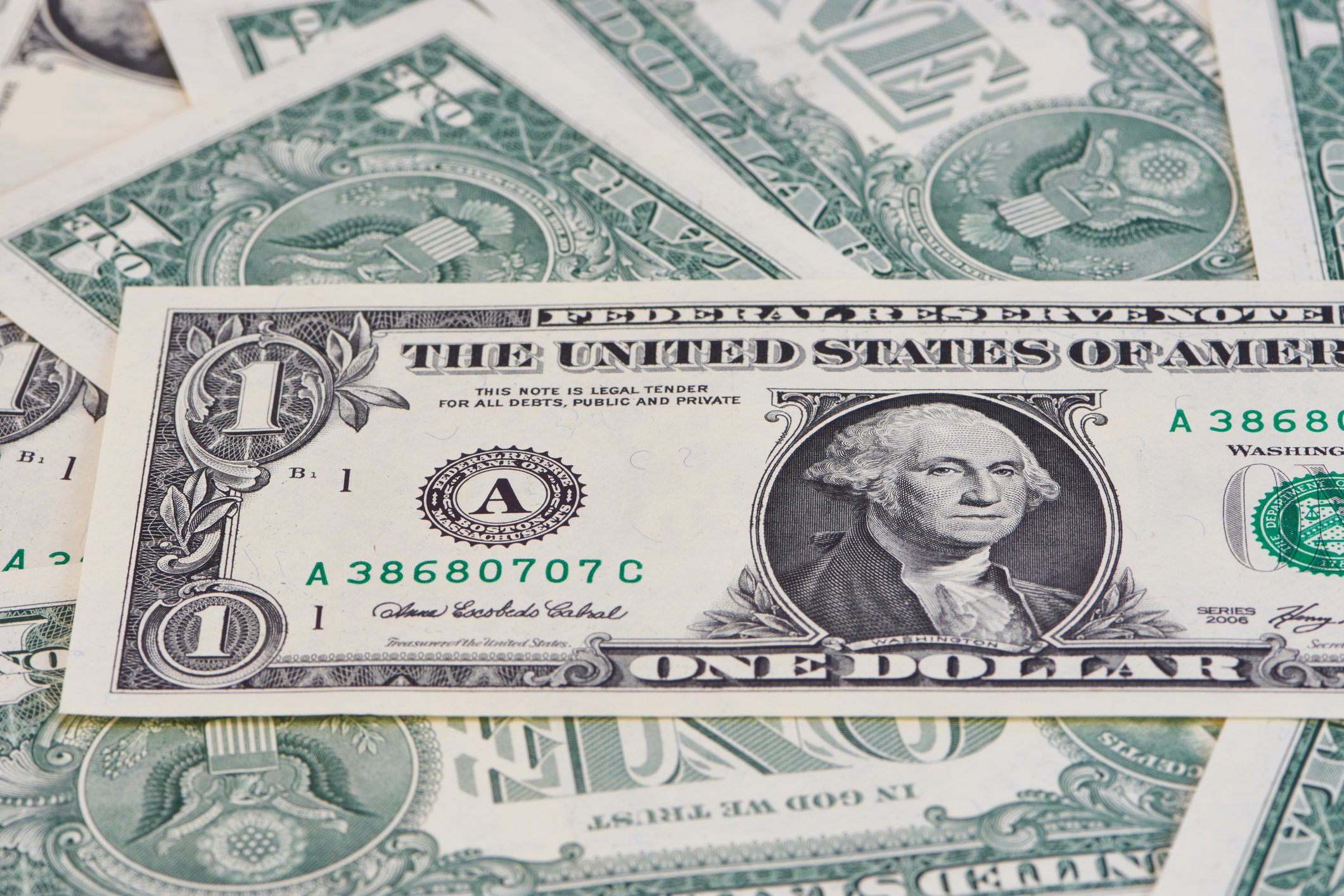 Many overlapping dollar bills