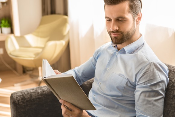 A man is reading a book
