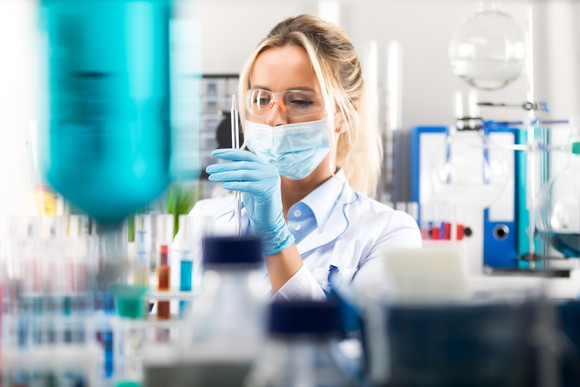 A woman working in a lab
