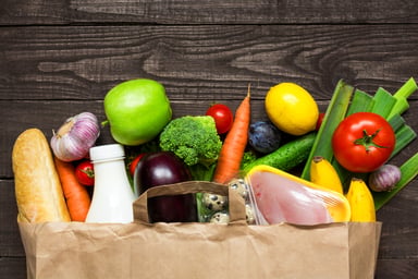 grocery bag full of fresh produce