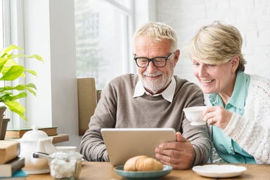 Older couple using a tablet