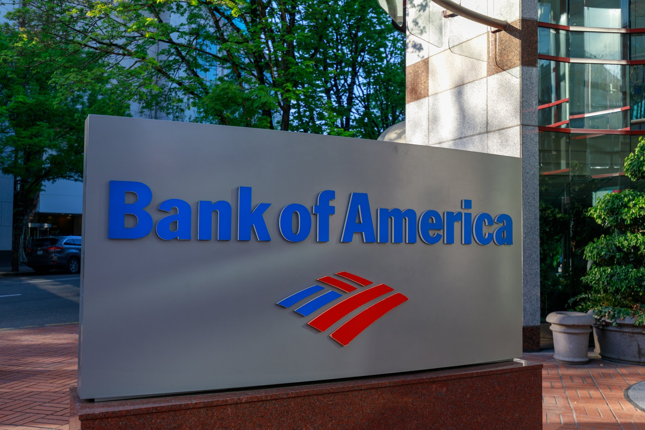 A corporate sign outside of a building that reads "Bank of America"
