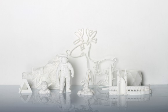 A collection of 3D-printed objects in white plastic