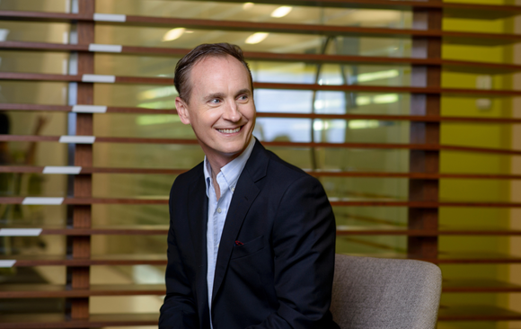 Motley Fool co-founder David Gardner smiles.