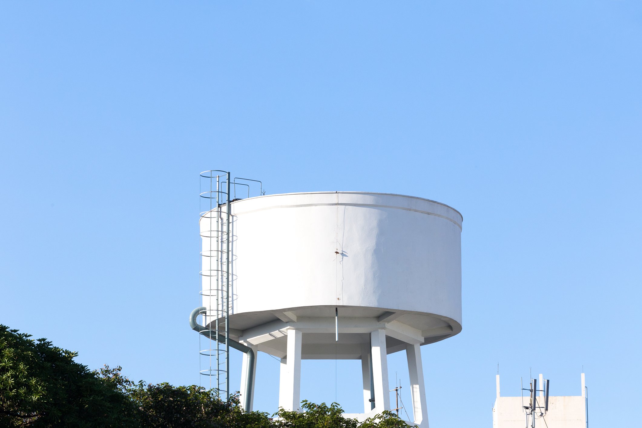 An elevated urban water tank.