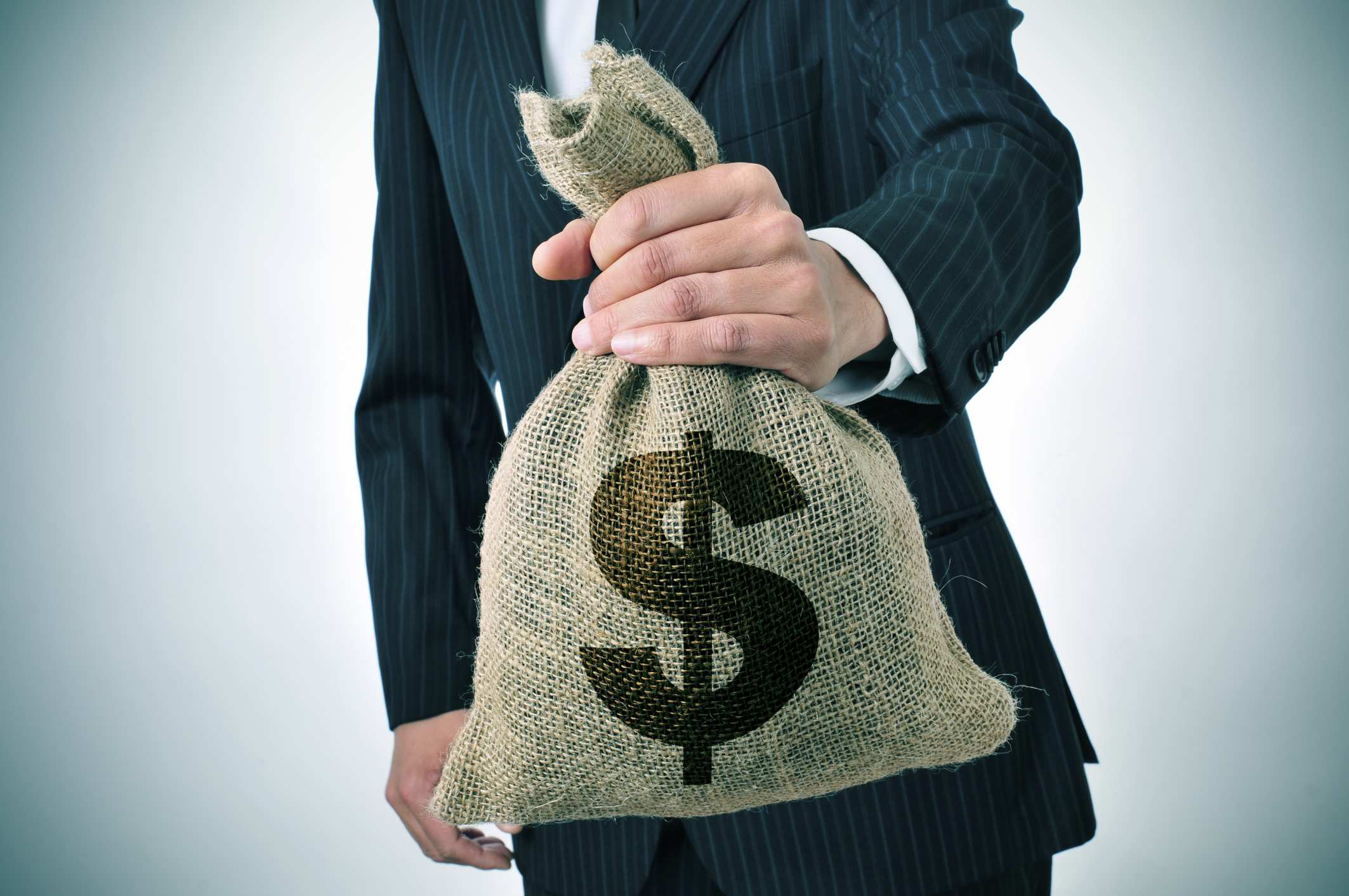 Image shows a bag of money