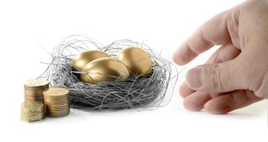 Getty - taking golden egg from nest