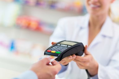 Getty-Images-Paying-Drugstore
