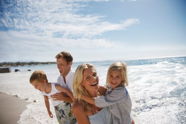 Family at the beach_GettyImages-116377131