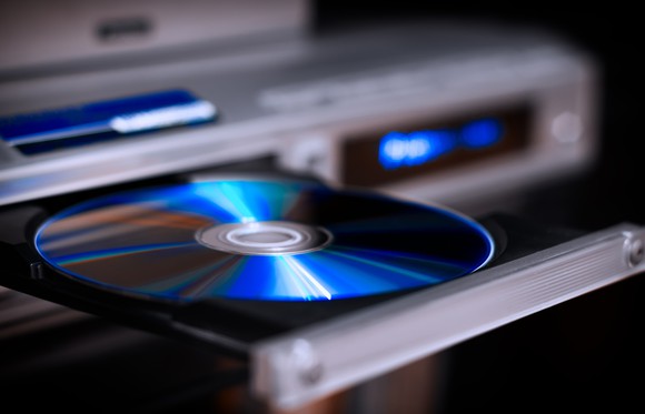 DVD player with a disc in its open tray