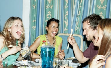 20somethings eating dinner_GettyImages-83826971