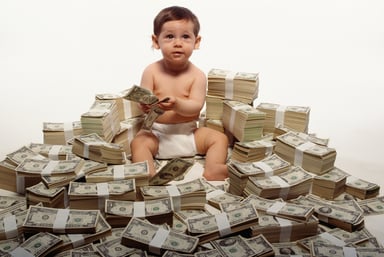 Getty - rich kid baby on money