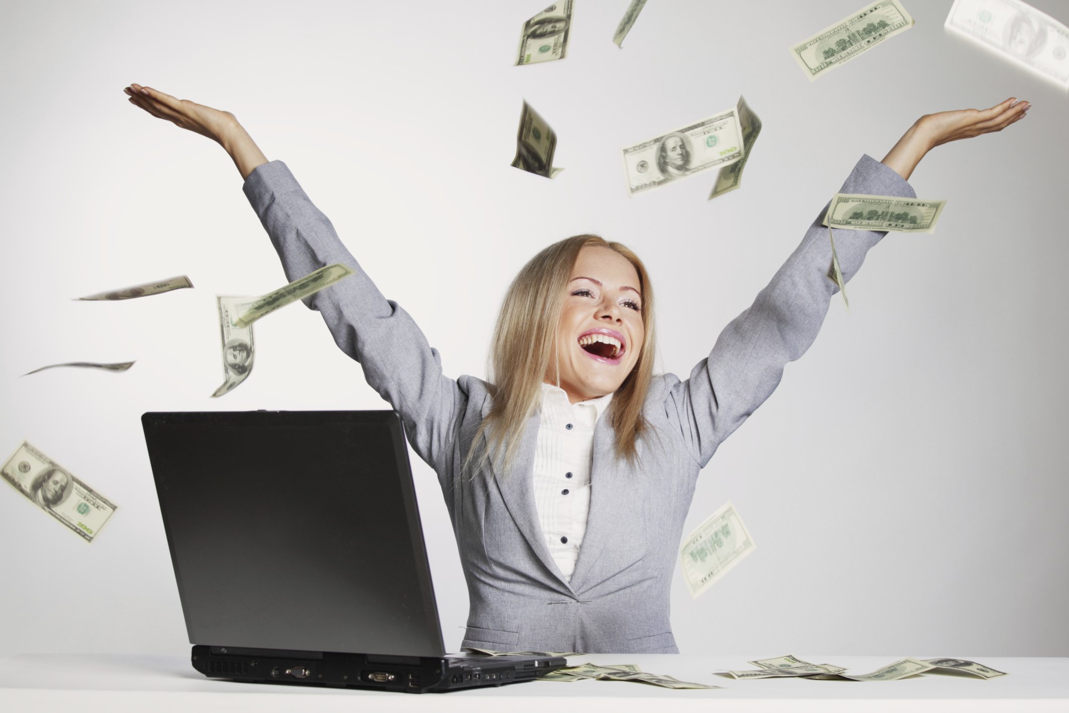 Woman Throwing Money Raining Money Getty
