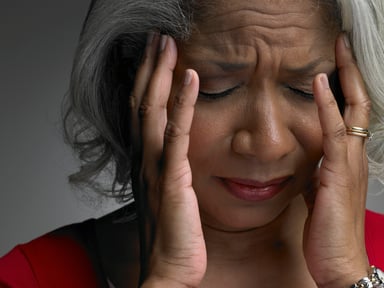 woman with migraine_GettyImages-sb10063626bc-001