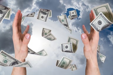 Getty - hands and money from the sky