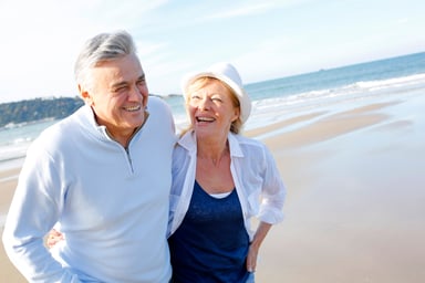 happy retirees on the beach_GettyImages-476200301