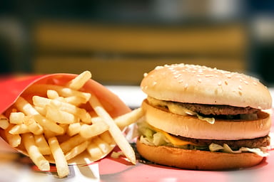 A fastfood burger and fries