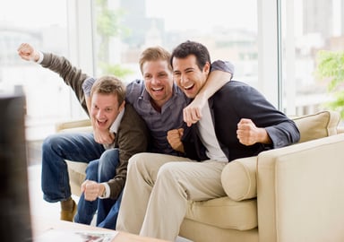 younger guys on couch_GettyImages-107430118
