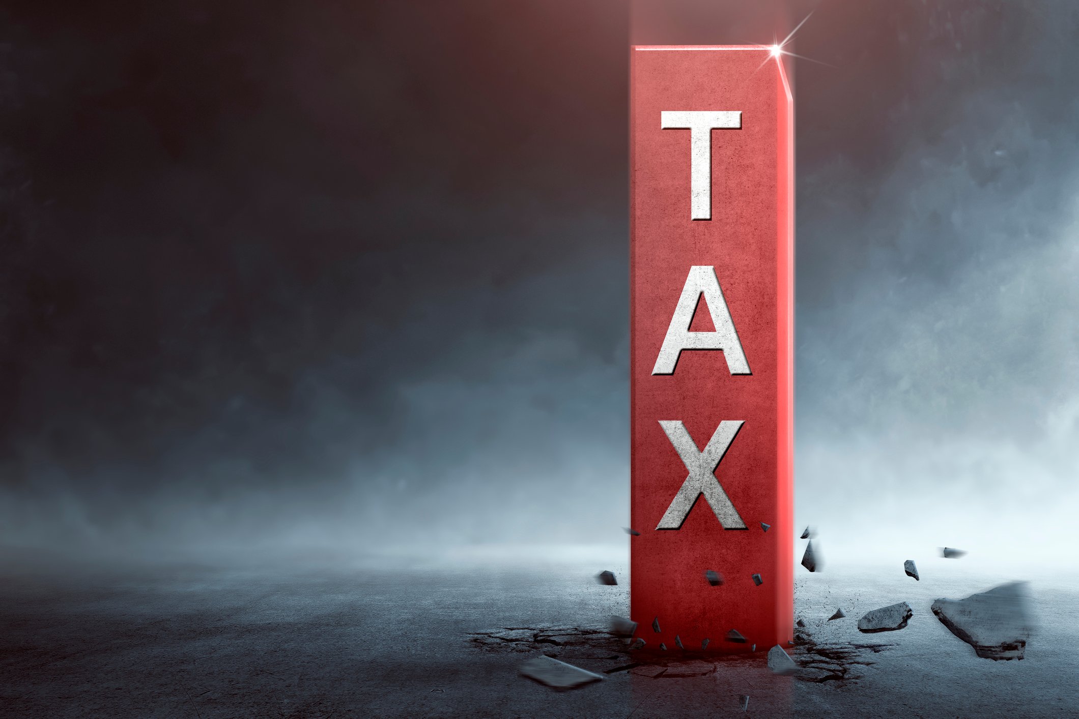 TAX written on a red vertical piece of wood.
