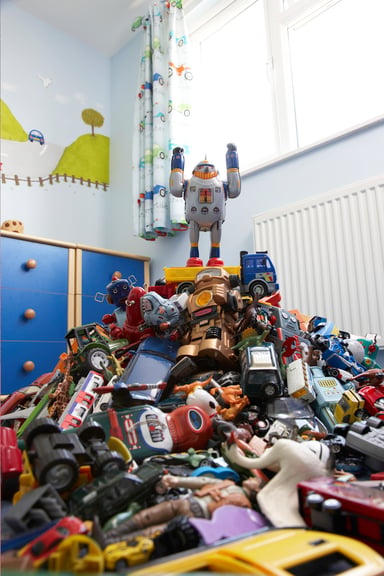 Toys pile bedroom childhood getty