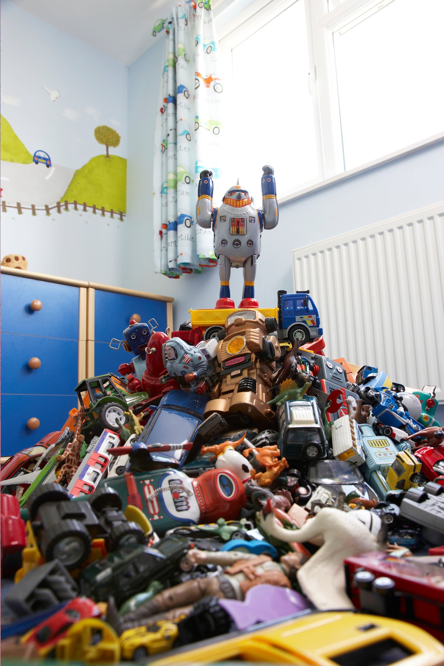 Toys pile bedroom childhood getty
