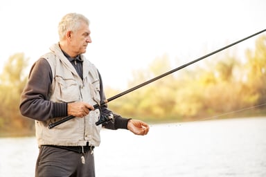 older man fishing_GettyImages-187817666