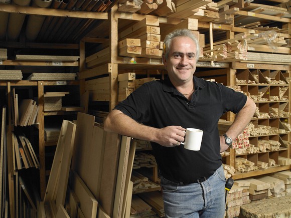 A senior worker in a lumber shop.