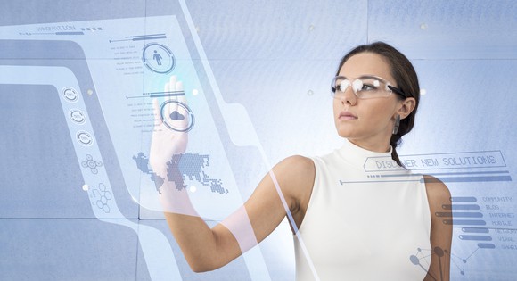 A woman using a digital control panel