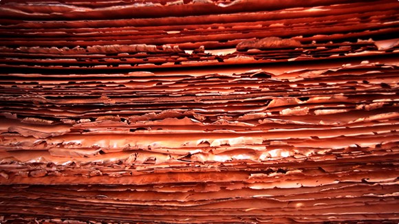 A stack of copper sheets. 