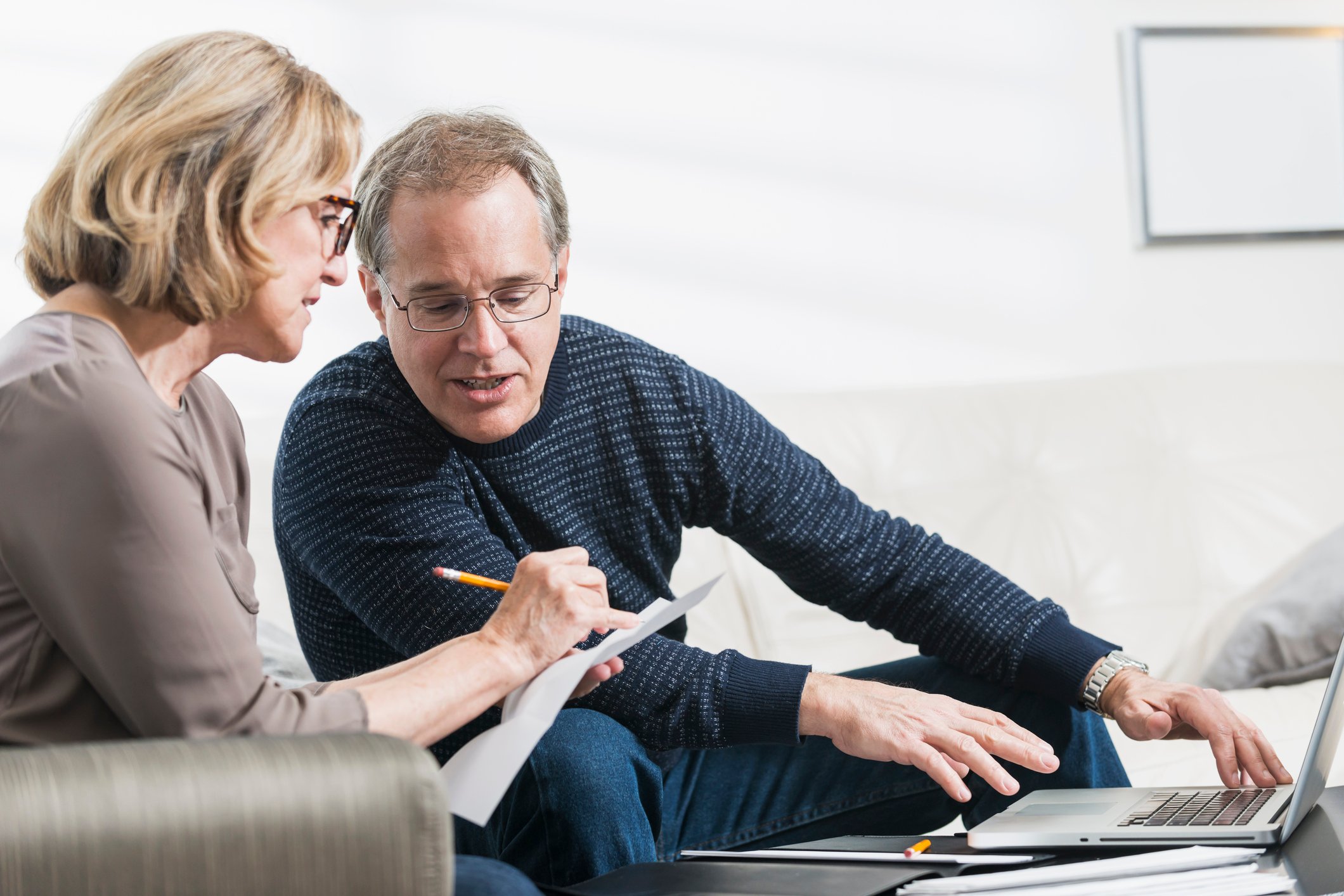 Older man and woman reviewing documents