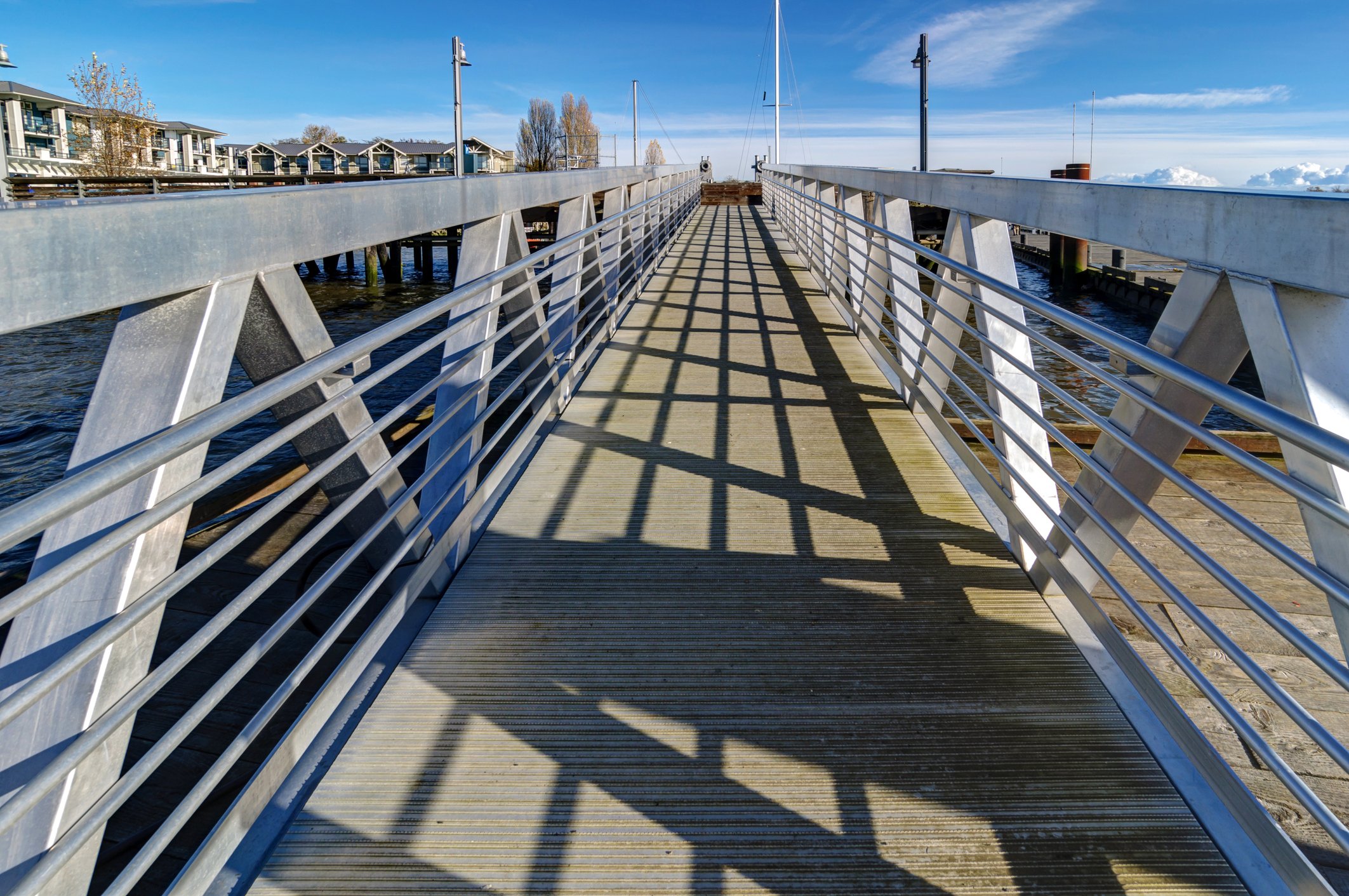The view from atop a bridge on a sunny day.