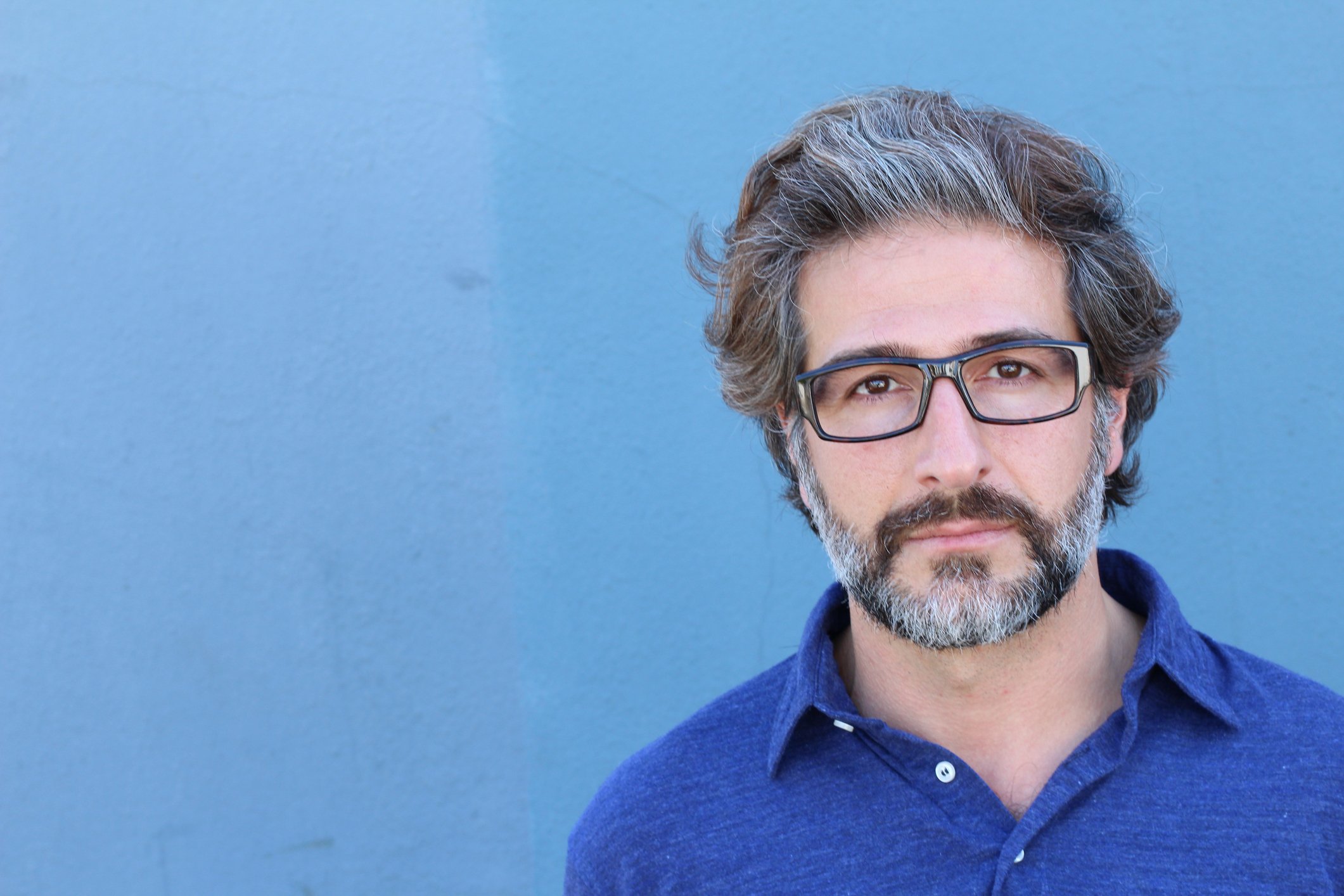 Serious-looking man worried about his 401(k)