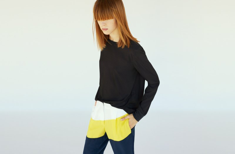 Woman wearing clothes from the Under Armour Sportswear line.