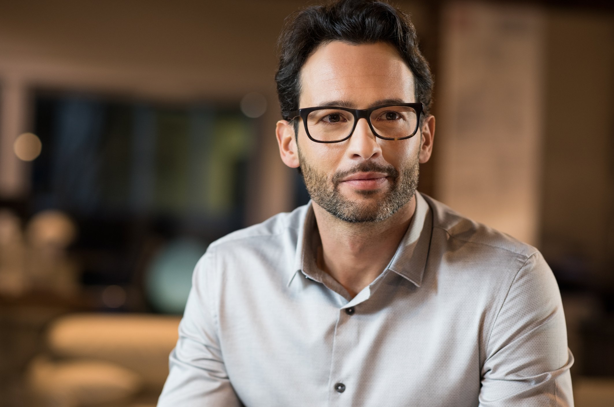 Man in his 30s, looking confident